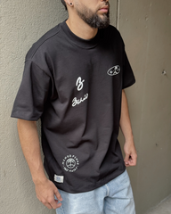 Camiseta Unisex Oversize Menos Penas Más Playa Negra (Algodón 270 grs)