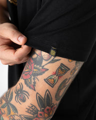 Camiseta unisex Escapadas X Bohío negra (Tela eco)